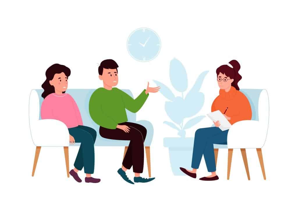 Imagen que representa el proceso de mediación en un divorcio, mostrando a un mediador facilitando una discusión constructiva entre dos individuos en un entorno neutral y respetuoso